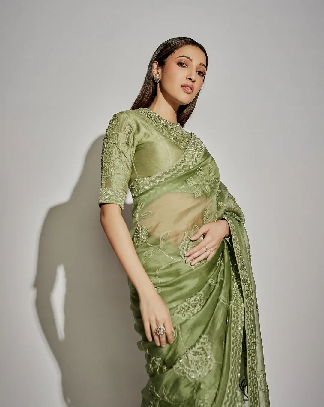 NEHA SHETTY WEARING BEAUTIFUL EARRINGS GREEN DESIGNER SAREE